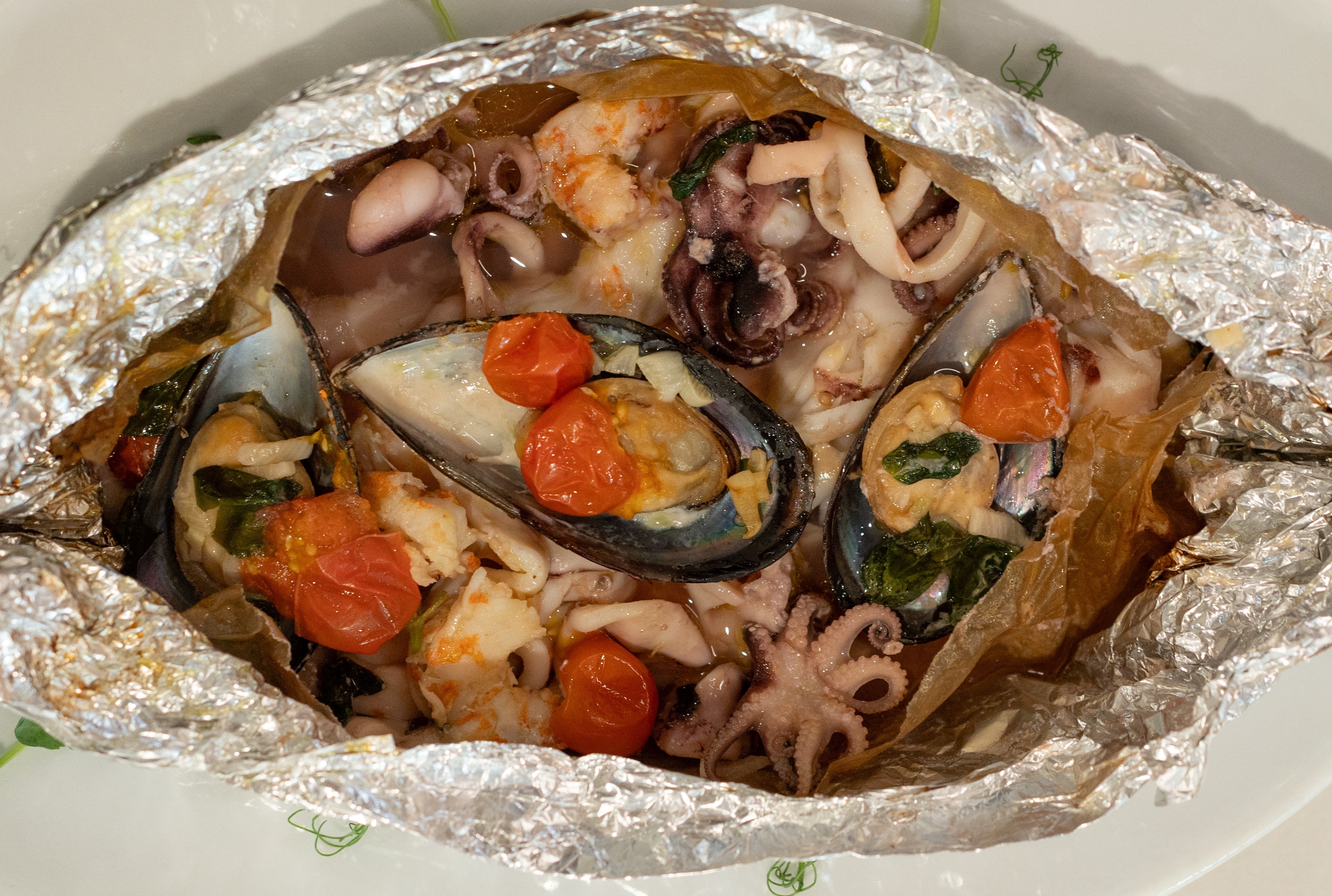 Морепродукты Cartoccio di mare